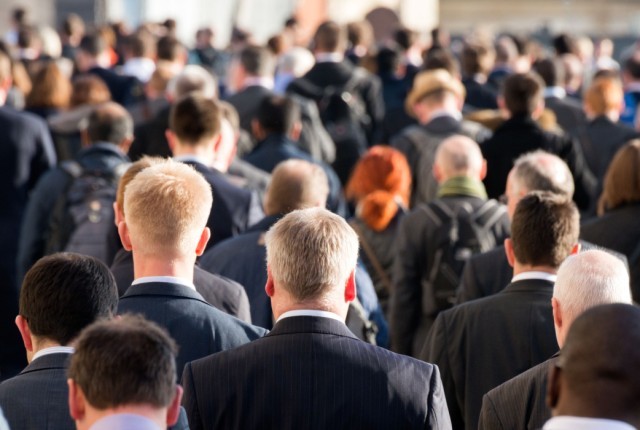 Commuters crossing crowded London Bridge.jpg